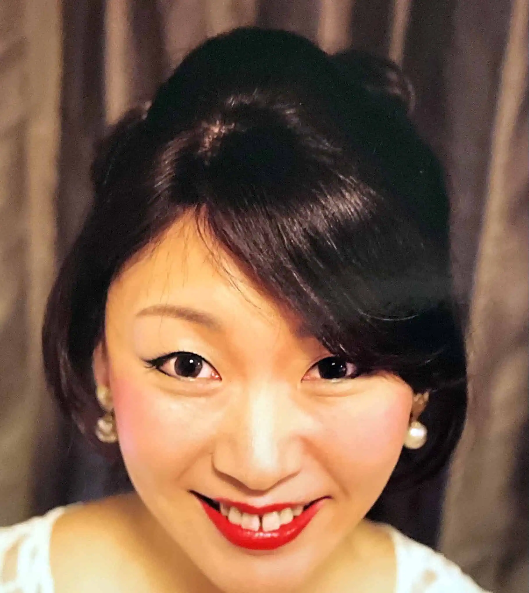 After view of woman with black wig.
